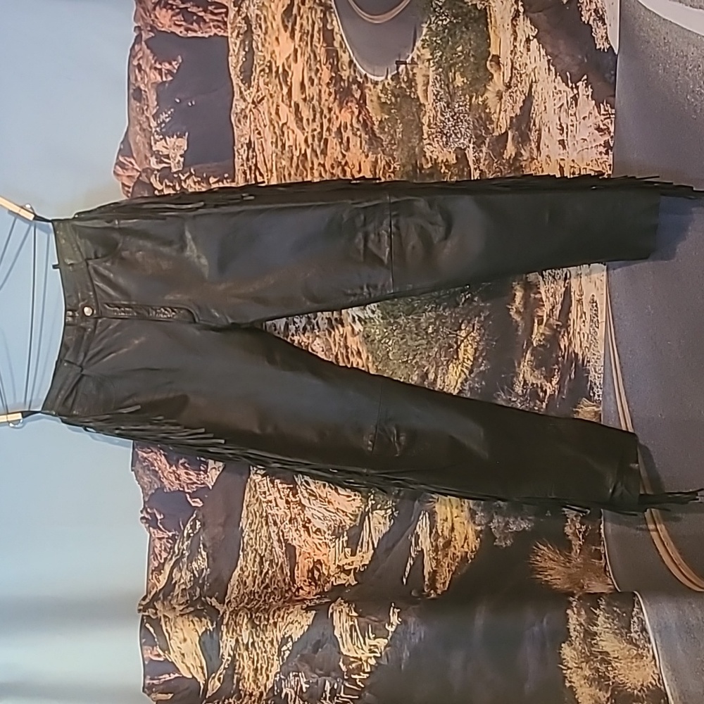 Black leather fringe pants
